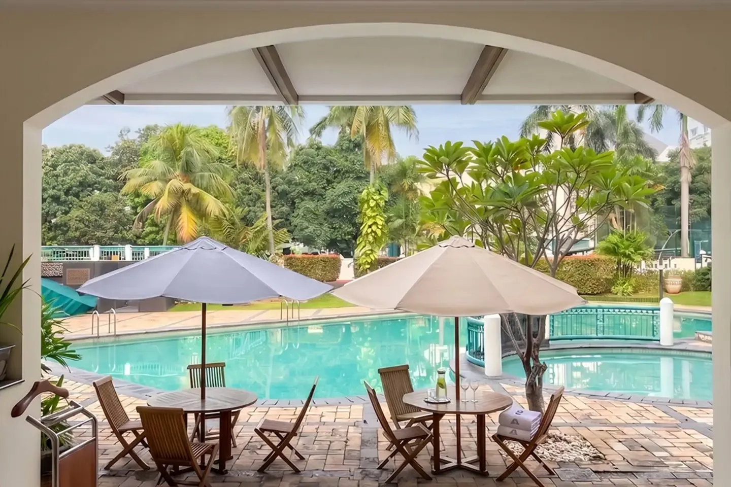 The pool framed by the poolside arcade